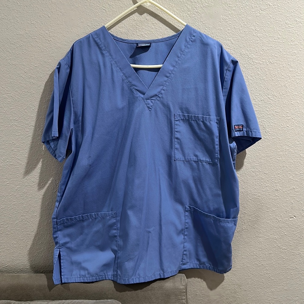 Worn work scrubs. (Ceil blue)